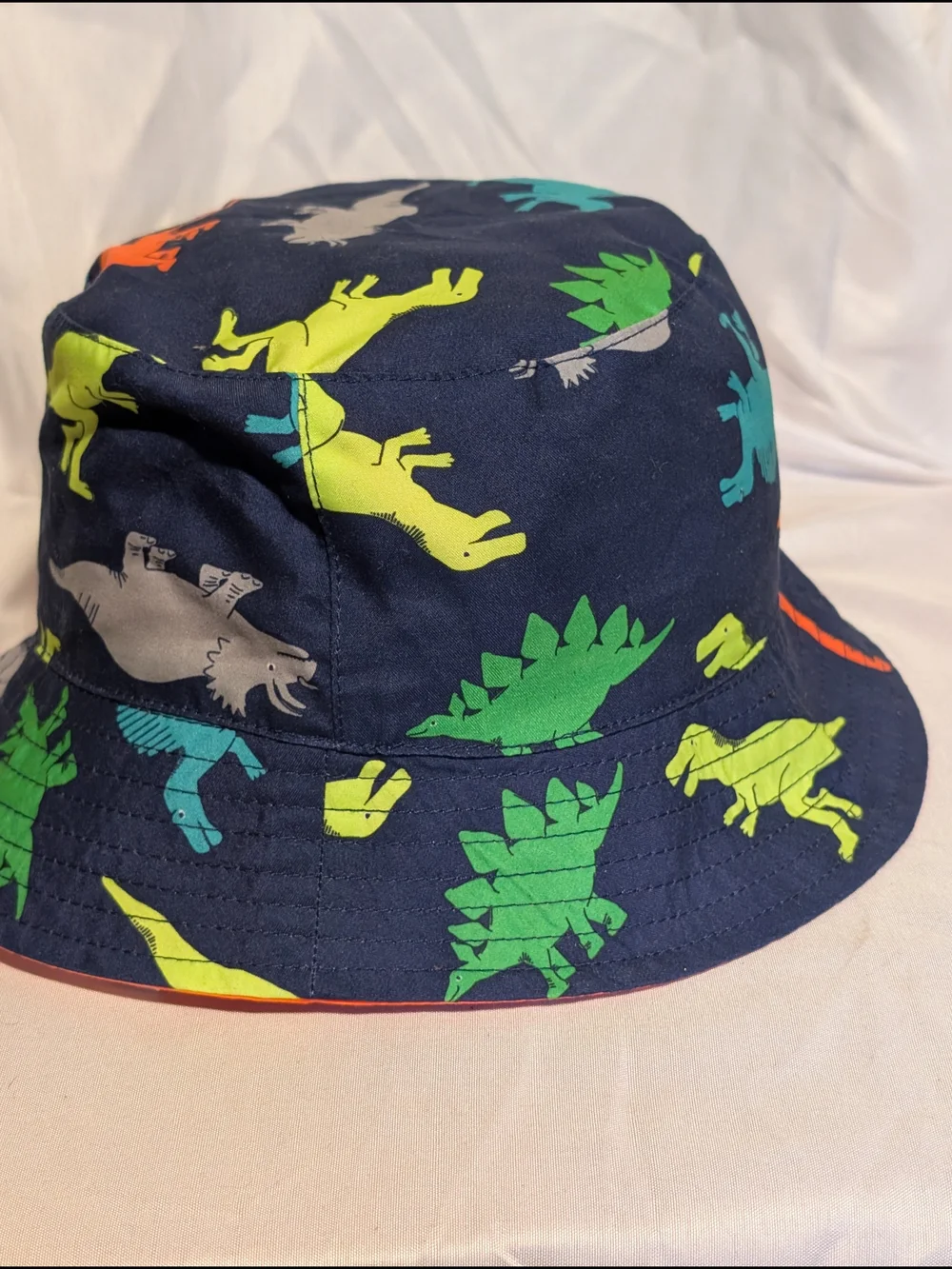 Carter's  Reversible Navy Bucket Hat with Bright Dinosaur Prints